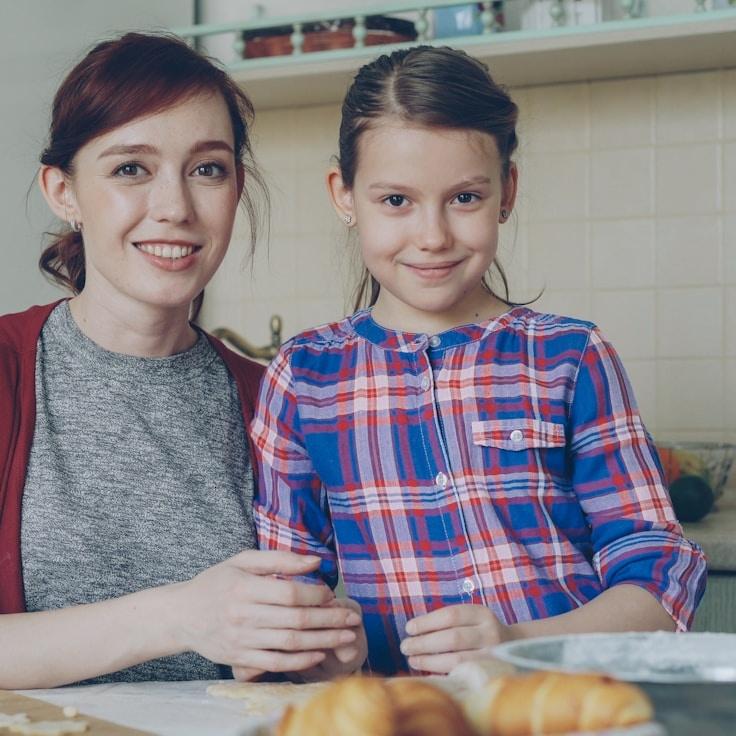Aria Chen, Lead Design Curator at Sandy Rustic Valley, reviewing corporate floral arrangements